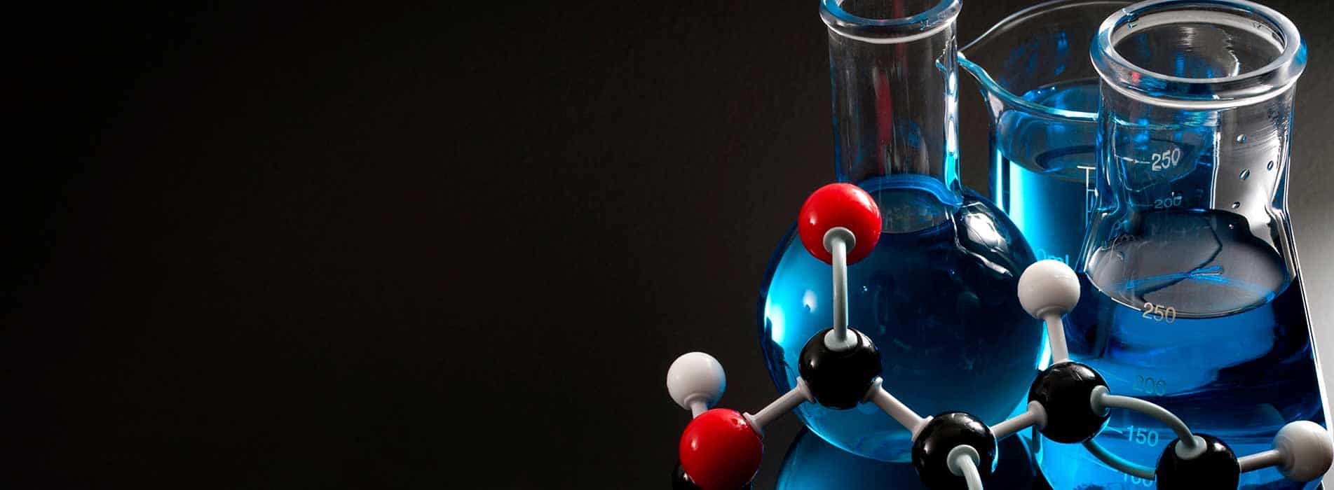 Homeschool chemistry curriculum banner of beakers with blue fluid and ball-and-stick molecular model