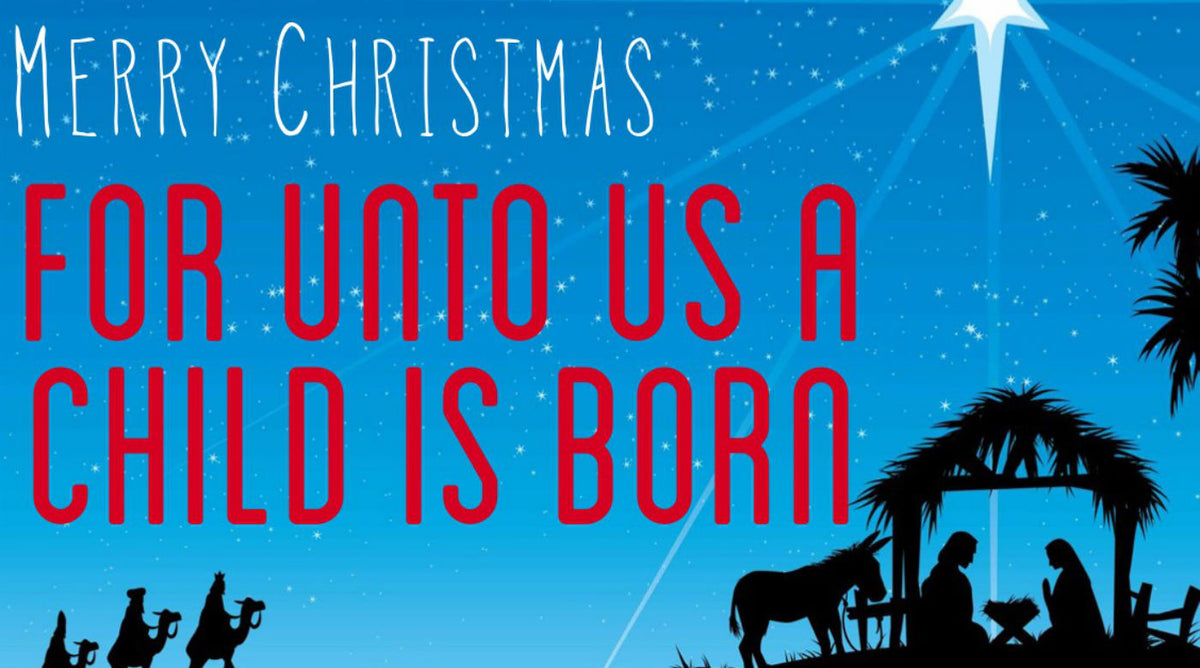 Banner of a nativity and caption for unto us a child is born