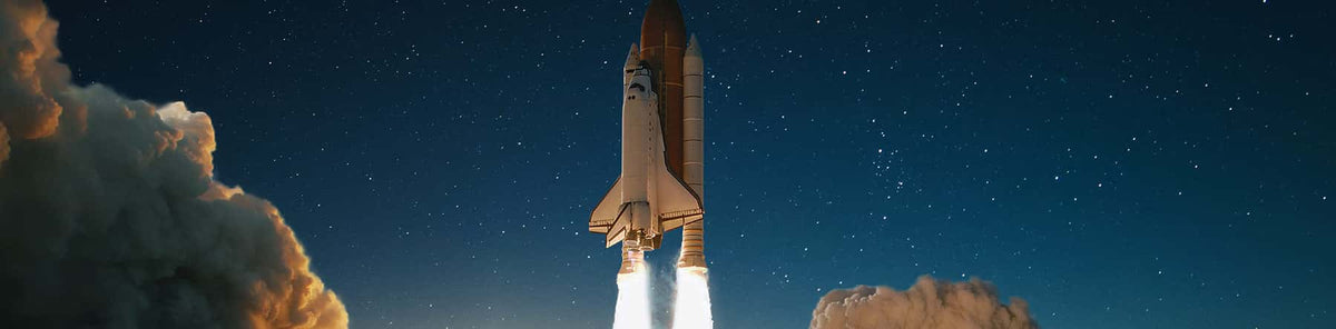 Physical Science homeschool curriculum banner of a shuttle launch at night