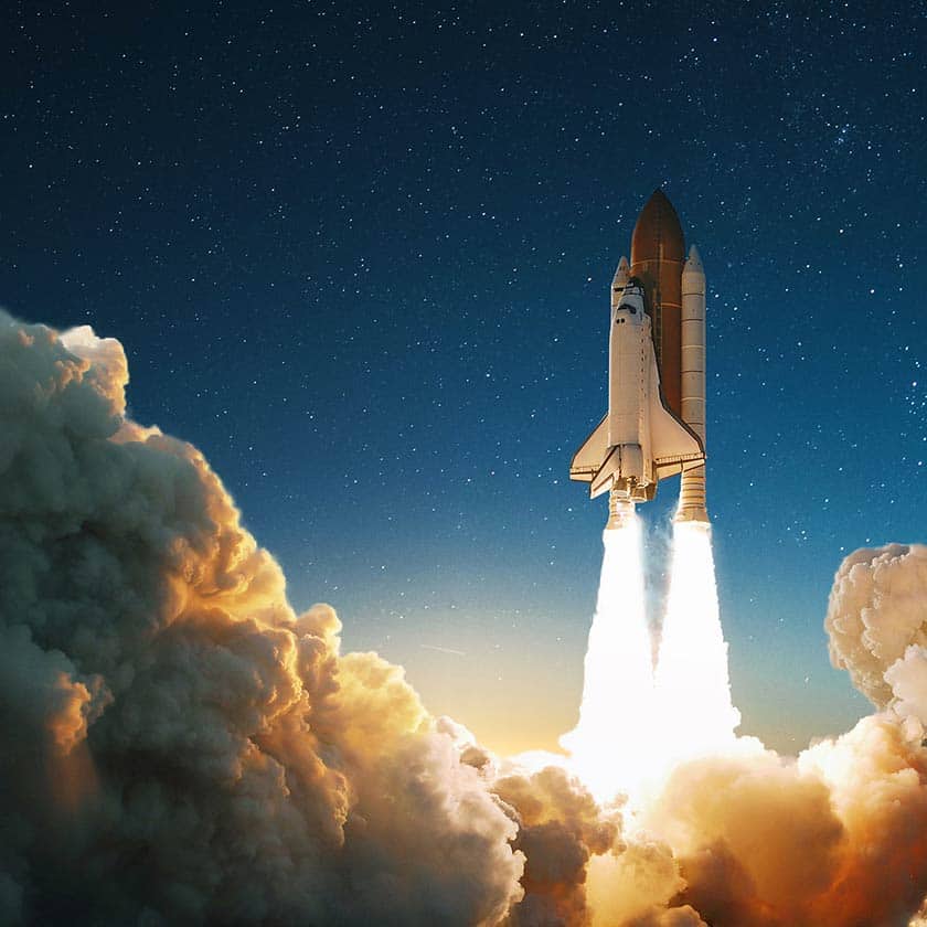 Science Shepherd homeschool Physical Science curriculum featured image of a shuttle launch at night with smoke from two engines and a background of stars